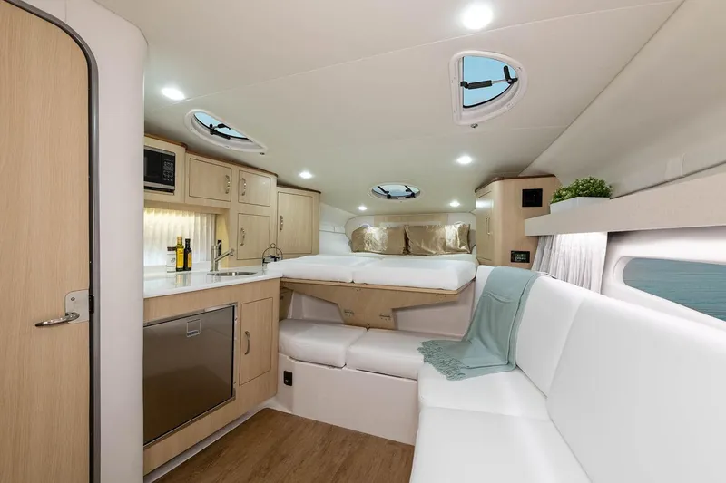 Slide: The Image of Manufacturer Provided Image: Luxurious interior of 2026 Regal 33 Express yacht with modern amenities and elegant design. - 8