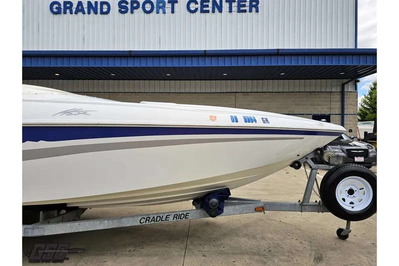 Slide: The Image of 2004 Baja H2X boat on trailer at Grand Sport Center. - 11