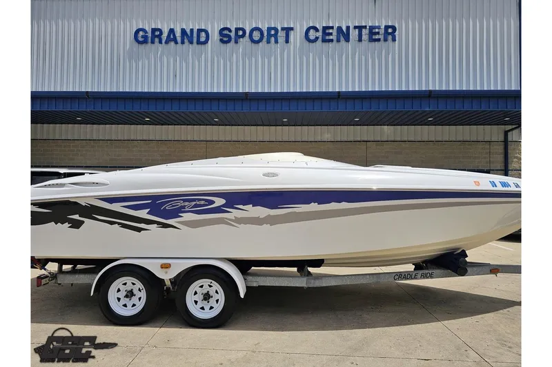 Slide: The Image of 2004 Baja H2X boat on trailer at Grand Sport Center. - 3
