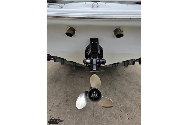 Slide: The Image of Rear view of a 2004 Baja H2X boat showing the propeller and exhaust ports. - 31