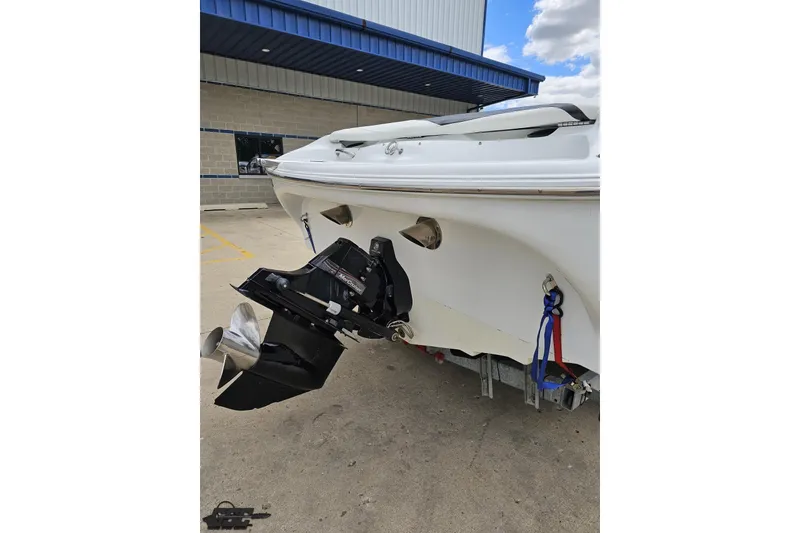 Slide: The Image of 2004 Baja H2X boat rear view with outboard motor and trailer. - 37