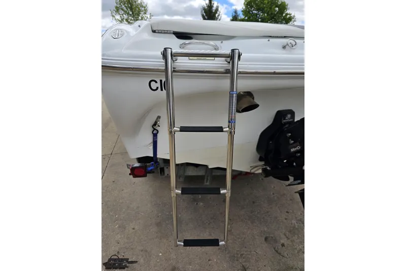 Slide: The Image of Rear view of 2004 Baja H2X boat with stainless steel ladder. - 41