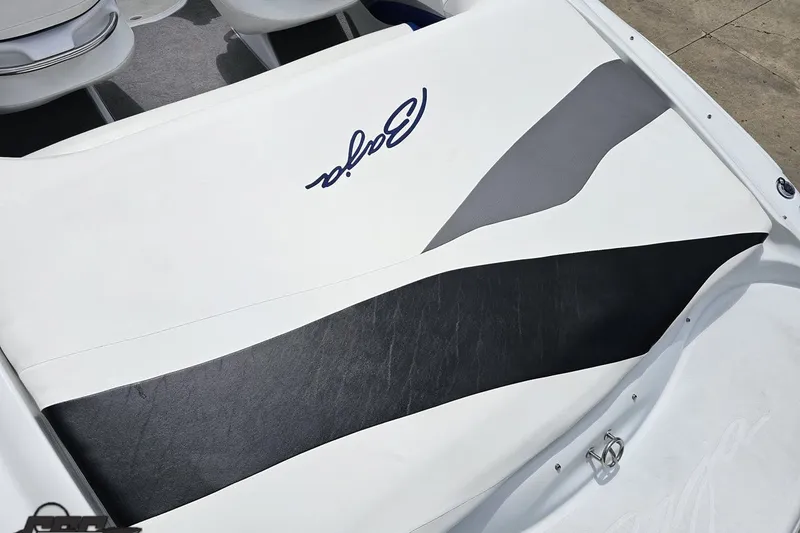 Slide: The Image of 2004 Baja H2X boat interior with stylish black and gray upholstery design. - 43