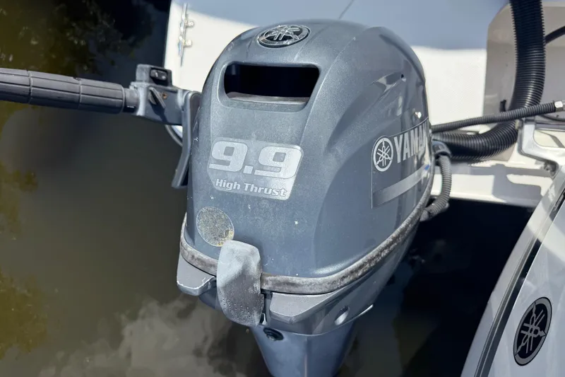 Slide: The Image of Yamaha 9.9 High Thrust outboard motor on 2019 Ranger Tugs R-27 boat. - 11