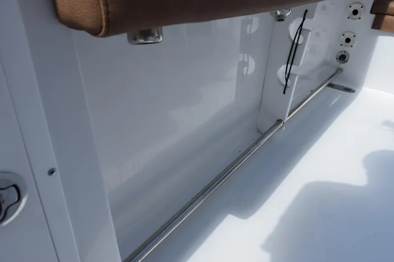 Slide: The Image of 2022 Sea Hunt Gamefish 27 boat interior with stainless steel rod holders. - 13