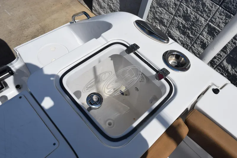 Slide: The Image of 2022 Sea Hunt Gamefish 27 boat's livewell and seating area detail. - 20
