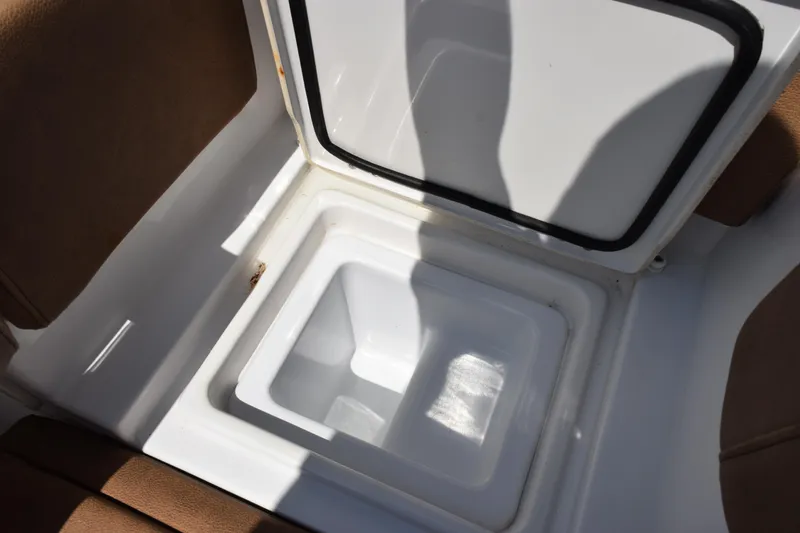 Slide: The Image of Open storage compartment on 2022 Sea Hunt Gamefish 27 Forward Seating boat. - 22