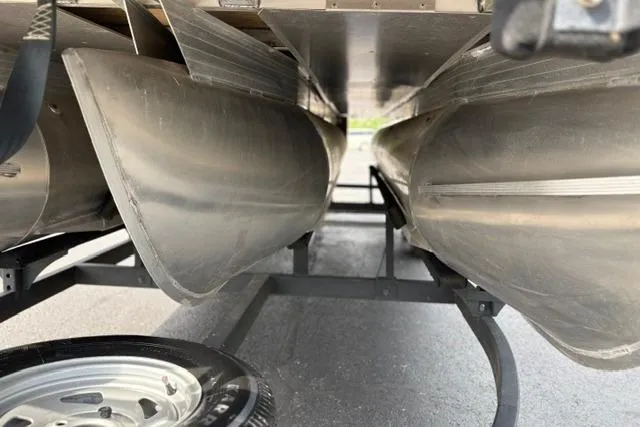 Slide: The Image of Underneath view of a 2022 Sun Tracker Fishin' Barge 22 XP3 pontoon boat. - 12