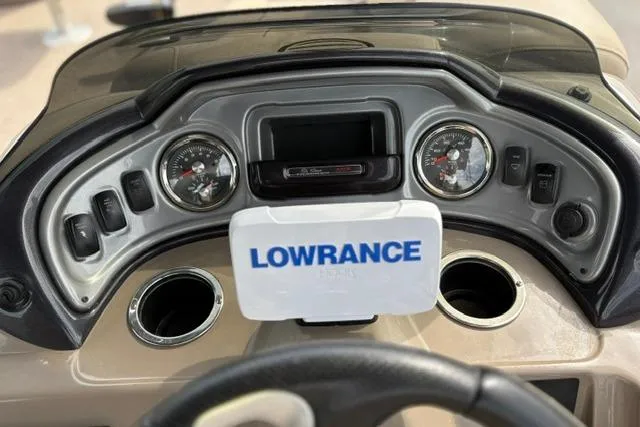 Slide: The Image of Dashboard of 2022 Sun Tracker Fishin' Barge 22 XP3 with Lowrance electronics. - 14
