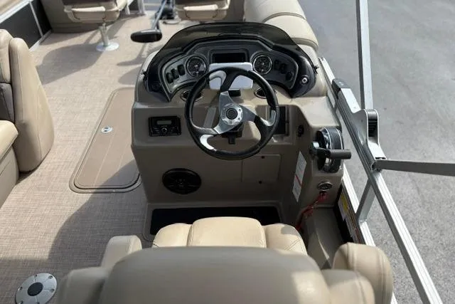 Slide: The Image of 2022 Sun Tracker Fishin' Barge 22 XP3 boat interior with steering console and seating. - 15