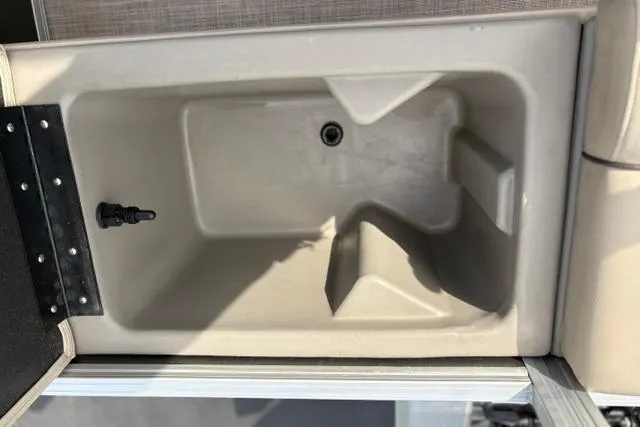 Slide: The Image of Livewell compartment in 2022 Sun Tracker Fishin' Barge 22 XP3 pontoon boat. - 26
