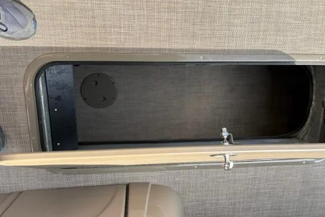 Slide: The Image of Storage compartment on 2022 Sun Tracker Fishin' Barge 22 XP3 pontoon boat. - 30