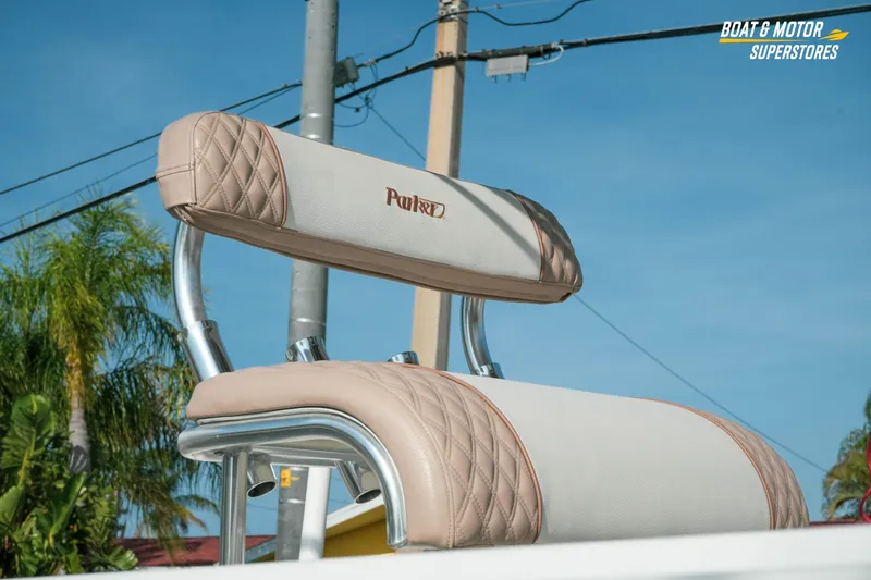 Slide: The Image of Parker 2801 Center Console boat seat, 2015 model, with beige upholstery and chrome accents. - 16