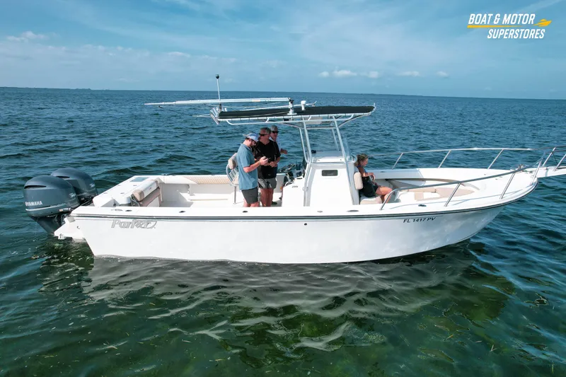 Slide: The Image of 2015 Parker 2801 Center Console boat on open water with passengers enjoying the ride. - 3