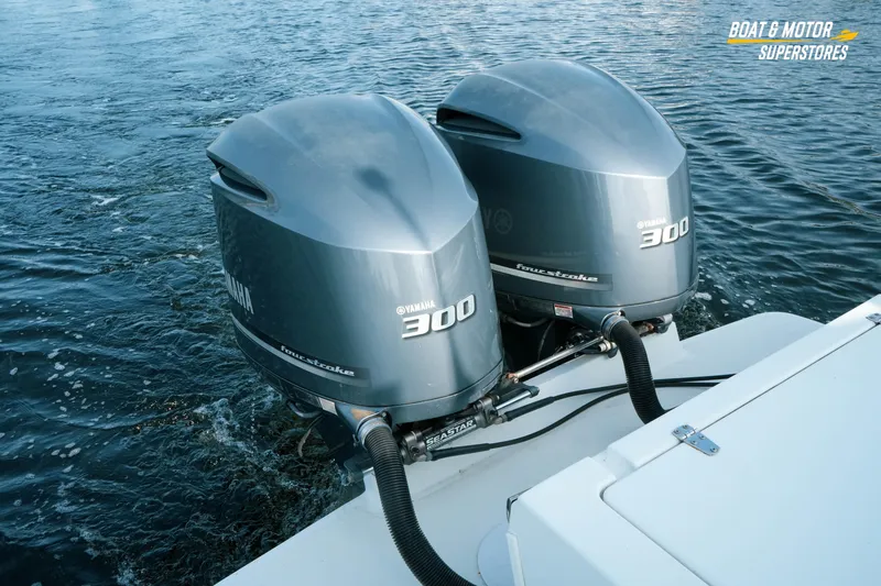 Slide: The Image of Twin Yamaha 300 outboard engines on a 2015 Parker 2801 Center Console boat. - 30