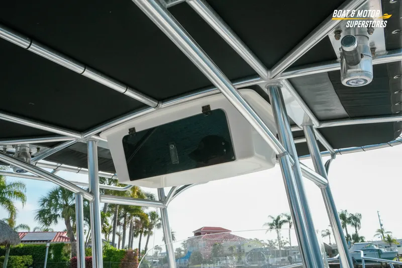 Slide: The Image of 2015 Parker 2801 Center Console boat with T-top and storage compartment. - 32