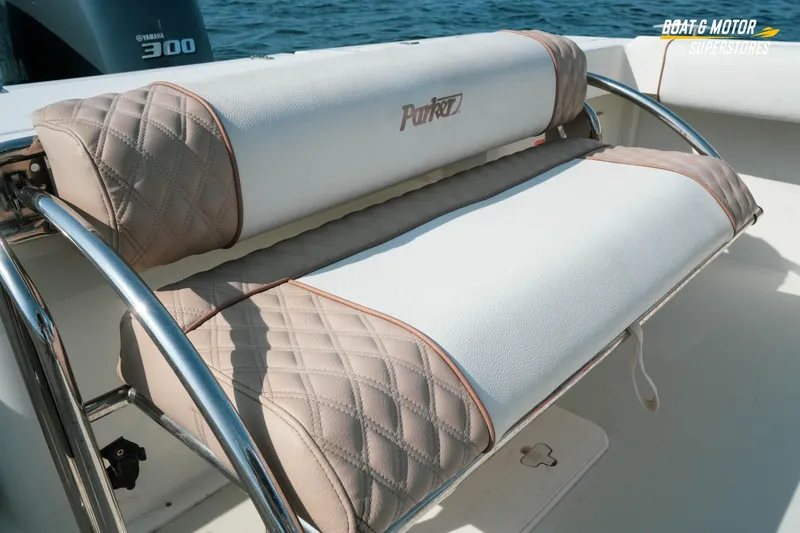 Slide: The Image of Parker 2801 Center Console 2015 boat seat with quilted upholstery and chrome accents. - 41