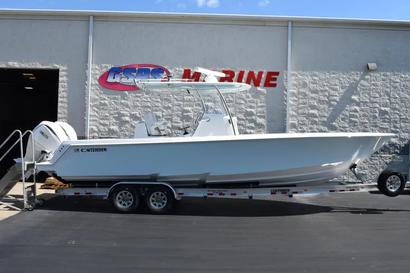 The Image of 2026 Contender 32 ST boat on trailer outside GSPS Marine building. - 1
