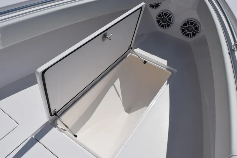 Slide: The Image of Open storage compartment on 2026 Contender 32 ST boat deck. - 17