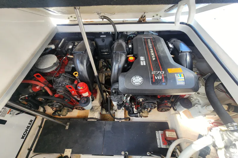 Slide: The Image of Engine compartment of a 2012 Chaparral 310 Signature boat with Volvo Penta V8 engines. - 6