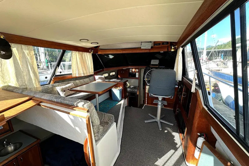 Slide: The Image of Settee to port, lower helm to starboard. - 5