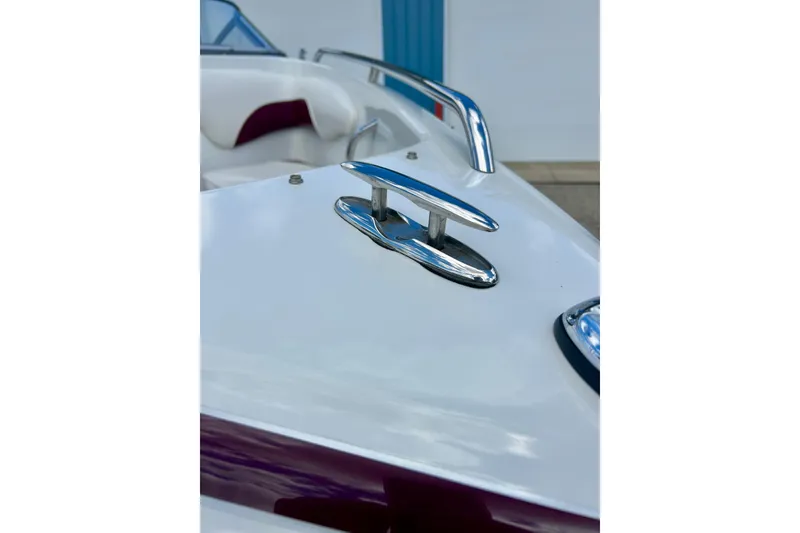 Slide: The Image of 2007 Crownline 180 BR boat with chrome cleat and railing detail. - 14