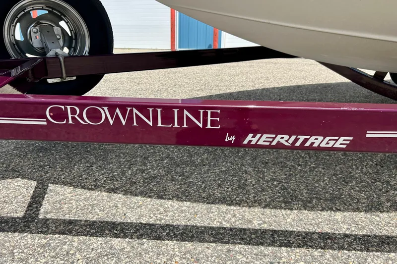 Slide: The Image of Trailer for 2007 Crownline 180 BR boat by Heritage, on pavement. - 15