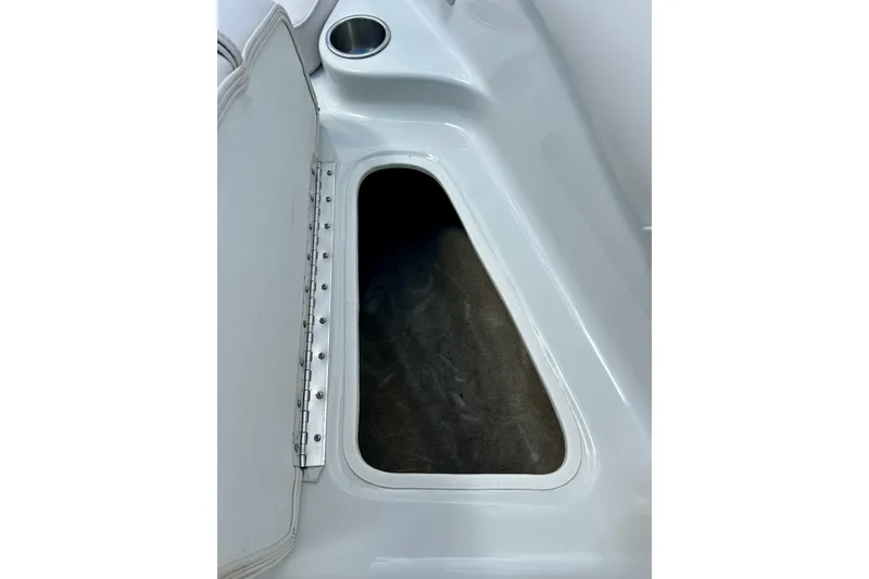 Slide: The Image of Open storage compartment in 2007 Crownline 180 BR boat interior. - 29
