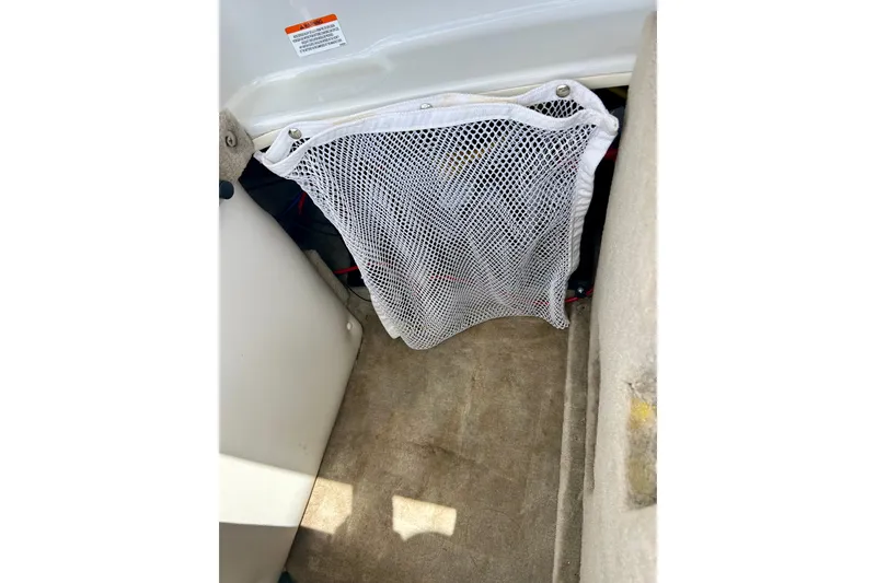 Slide: The Image of Interior of 2007 Crownline 180 BR boat with mesh storage pocket. - 40