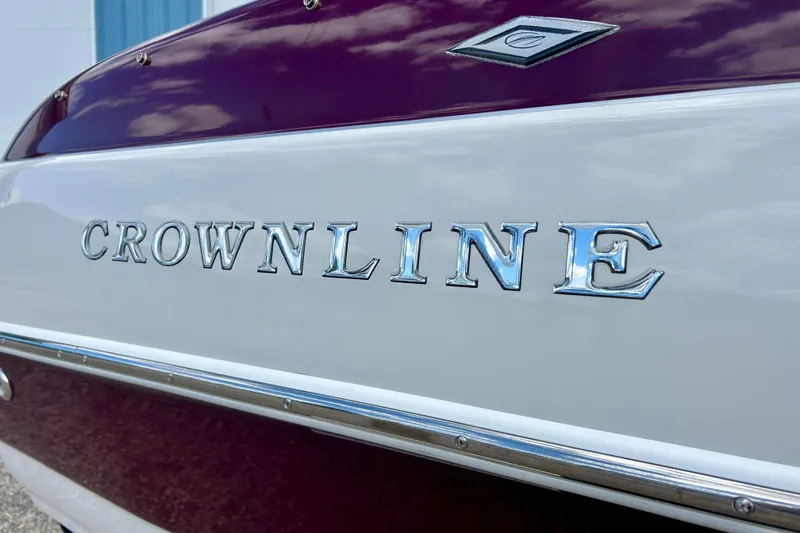 Slide: The Image of 2007 Crownline 180 BR boat with chrome lettering on the hull. - 7
