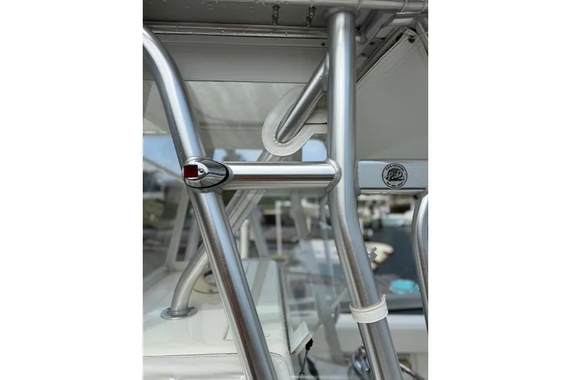 Slide: The Image of Close-up of 2014 SeaVee 290B boat's metal framework and fittings. - 10