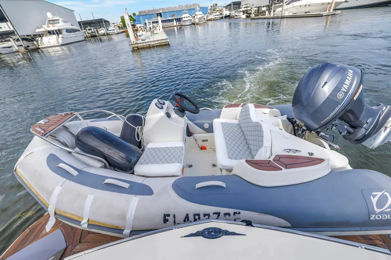Slide: The Image of Inflatable boat with Yamaha motor docked near Marquis 500 Sport Bridge, 2009 model. - 15