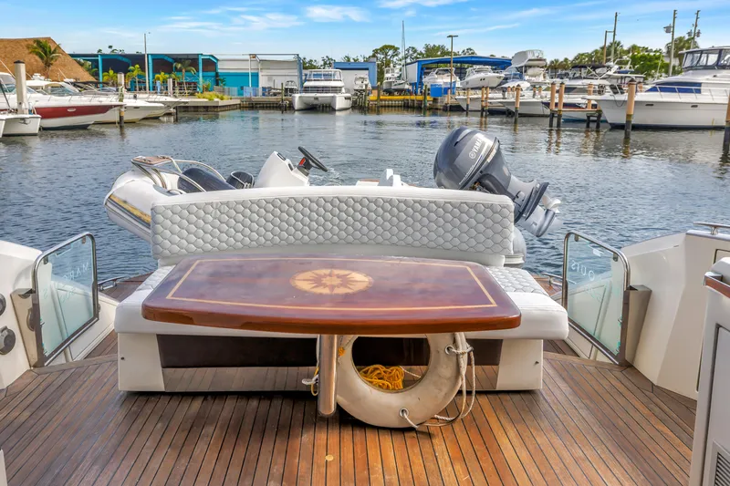 Slide: The Image of Luxury yacht deck with elegant seating and table, Marquis 500 Sport Bridge, 2009 model. - 22