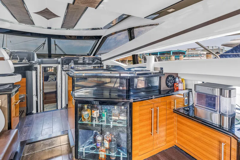 Slide: The Image of Luxurious interior of 2009 Marquis 500 Sport Bridge yacht with modern amenities and sleek design. - 28