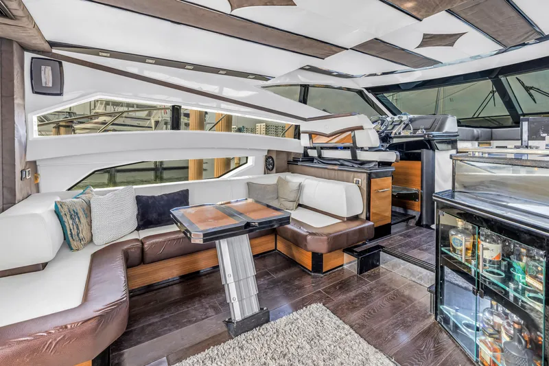 Slide: The Image of Luxurious interior of 2009 Marquis 500 Sport Bridge yacht with elegant seating and modern amenities. - 29