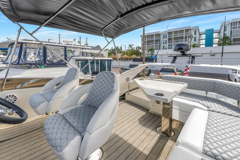 Slide: The Image of Luxurious 2009 Marquis 500 Sport Bridge yacht interior with plush seating and modern design. - 36