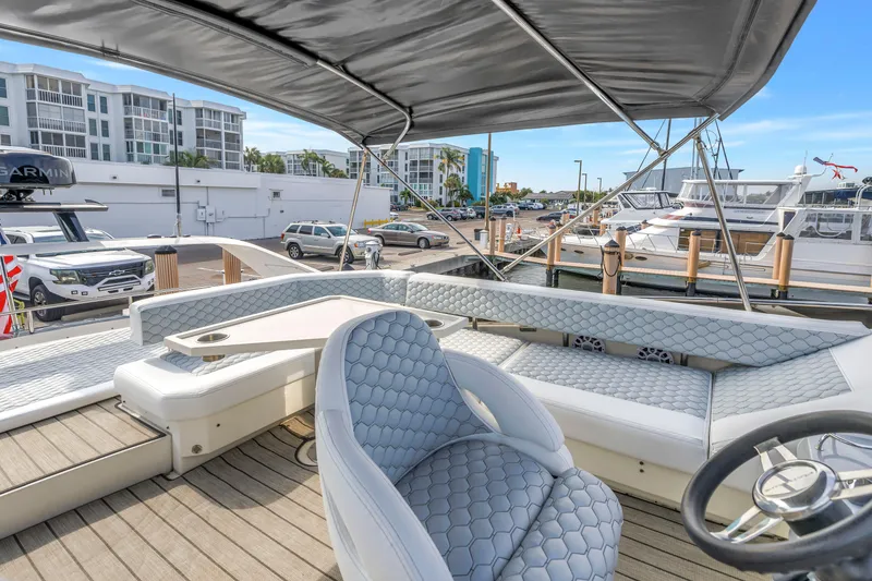 Slide: The Image of Luxurious 2009 Marquis 500 Sport Bridge yacht interior with elegant seating and modern design. - 37