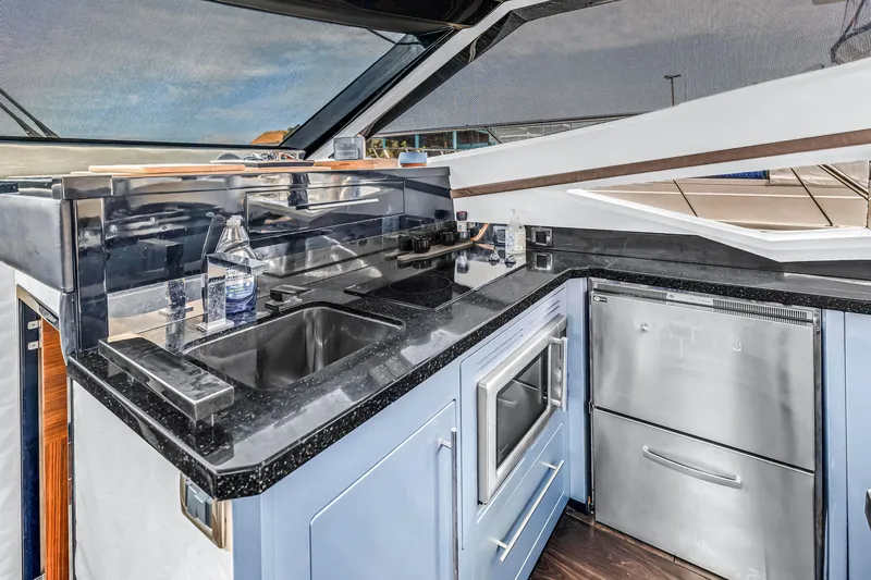 Slide: The Image of Luxurious 2009 Marquis 500 Sport Bridge yacht kitchen with modern appliances and sleek design. - 45