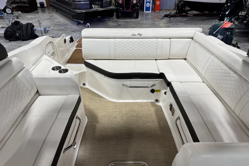 Slide: The Image of Interior of 2018 Sea Ray SDX 270 boat with white seating and modern design. - 10