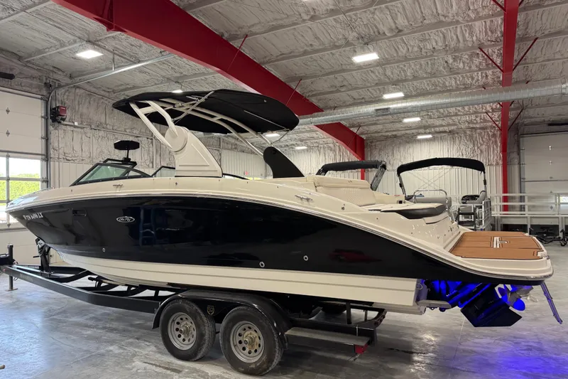 Slide: The Image of 2018 Sea Ray SDX 270 boat on trailer in indoor storage facility. - 3