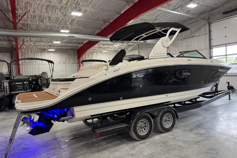 Slide: The Image of 2018 Sea Ray SDX 270 boat on trailer in indoor storage facility. - 4
