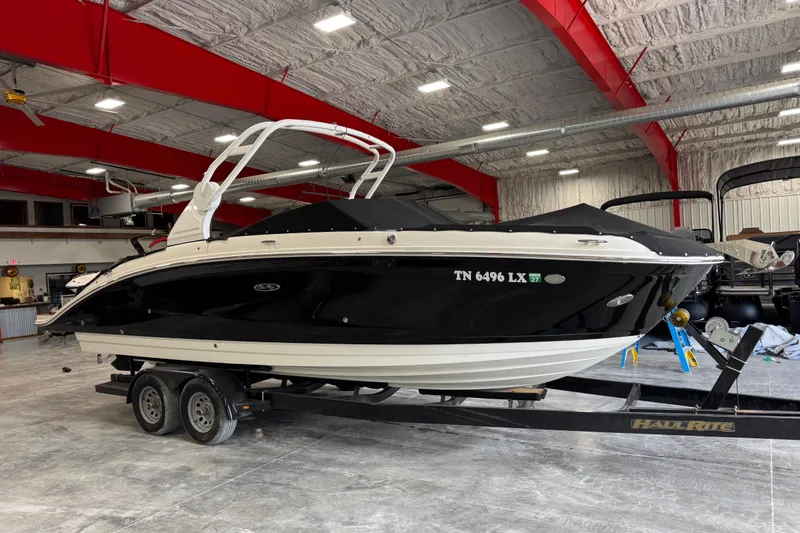 Slide: The Image of 2018 Sea Ray SDX 270 boat on trailer in indoor storage facility. - 6