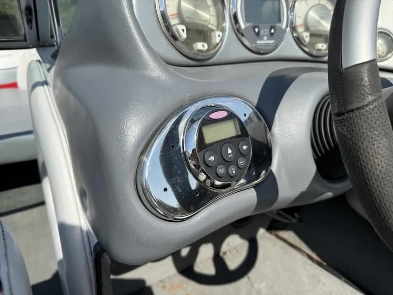 Slide: The Image of Dashboard of a 2008 Nautique Ski Nautique 206 with controls. - 13