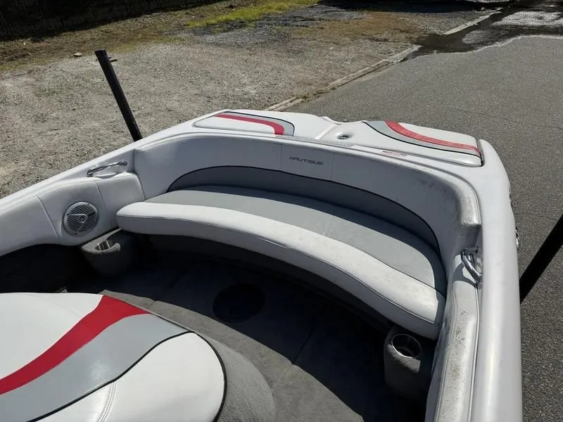 Slide: The Image of Interior of a 2008 Nautique Ski Nautique 206 boat with gray and red seating. - 18