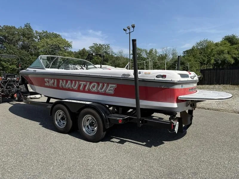 Slide: The Image of 2008 Nautique Ski Nautique 206 on trailer, red and white design. - 9