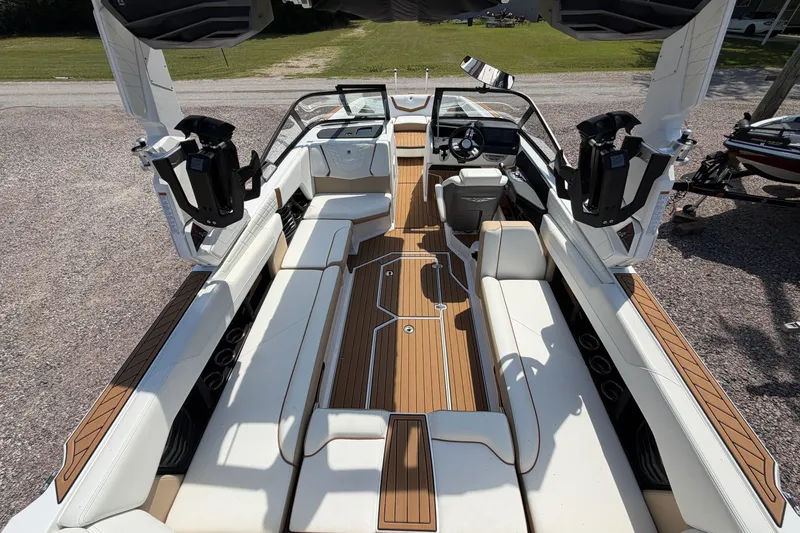 Slide: The Image of 2023 Nautique Super Air Nautique G25 interior with luxurious seating and modern design. - 13