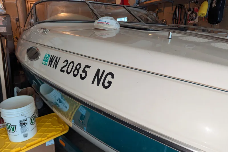 Slide: The Image of 1997 Stingray 200 CS boat in garage with registration number WN 2085 NG. - 6