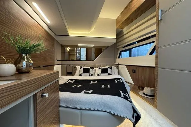 Slide: The Image of Luxurious interior of 2026 Cobrey 45 FLY yacht with modern bedroom design. - 18