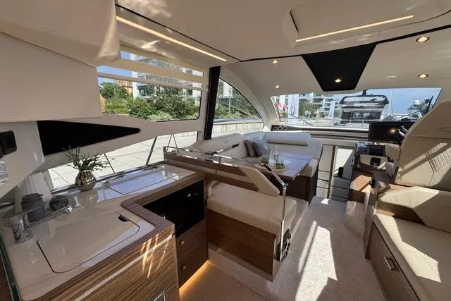 Slide: The Image of Luxurious interior of 2026 Cobrey 45 FLY yacht with modern furnishings and sleek design. - 9