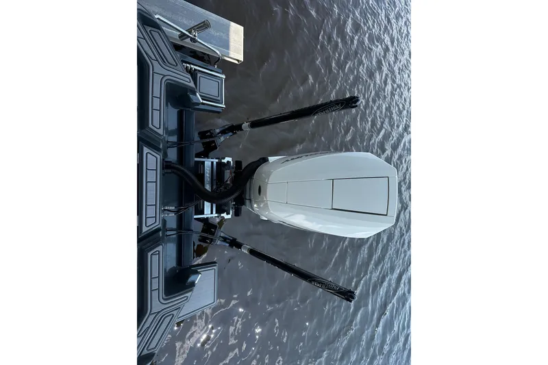 Slide: The Image of Overhead view of 2024 H-Craft 27 CC boat engine on water. - 14